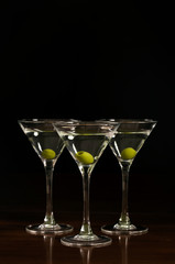 Three glasses of martini cocktail