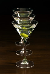 Three glasses of martini cocktail