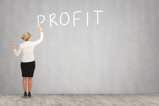 Business woman drawing on the wall. business concept
