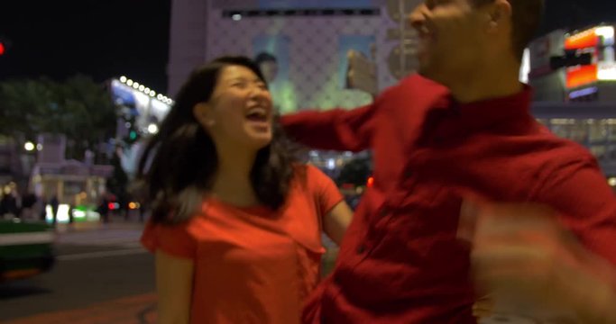 Attractive young Couple excited about traveling in Tokyo Japan Shibuya crossing hachiko 4k 
