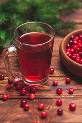 Cranberry tea in a glass cup 