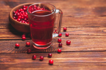 Cranberry tea in a glass cup 