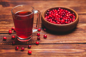 Cranberry tea in a glass cup 