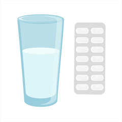 Glass with water and pills