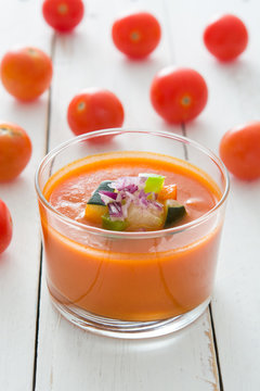 Gazpacho soup on white wooden table

