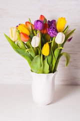 Color tulips in the vase