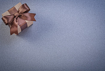 Present box in shop brown paper on grey background celebrations 