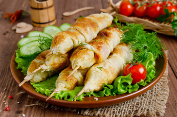 Kebab with tomatoes and cheese in pastry