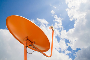 Orange Satellite dish and sky background