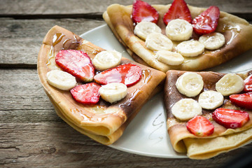 pancakes with banana and strawberries