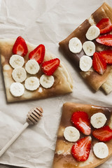 pancakes with banana and strawberries