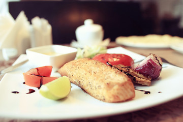 Salmon grill restaurant serving