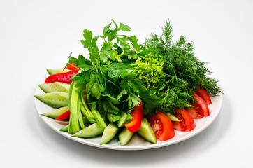 vegetables and herbs on a plate