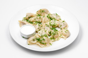 Russian dumplings boiled with dill