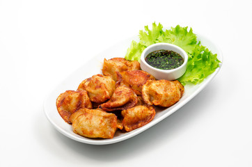 Fried dumplings with soy sauce