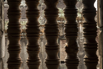 Column silhouette in a window of Banteay Srey buddhist khmer temple in Angkor Wat, Cambodia. 