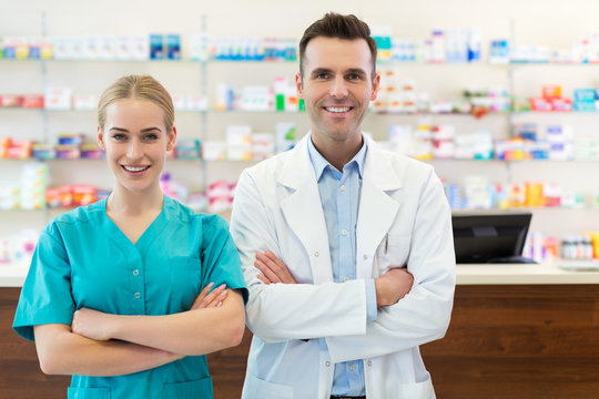 Female and male pharmacists 
