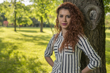 Naklejka premium Beautiful woman in park