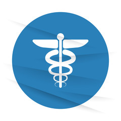 White Medical Symbol icon label on wrinkled paper
