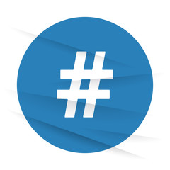 Obraz premium White Hashtag icon label on wrinkled paper