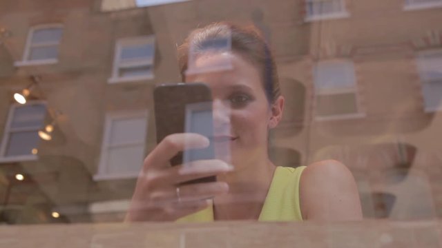 Woman using mobile phone