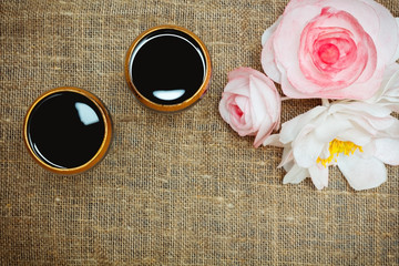 two glasses of white wine and flowers