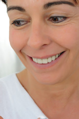 Obraz premium smiling fifty year old woman