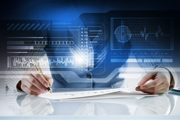 Woman signing papers