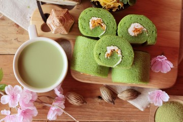 Green tea cake roll and matcha green tea.