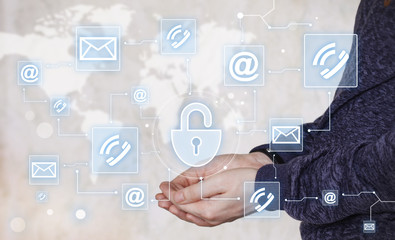 Businessman holds button lock security virtual network mail