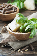 Ingredients for pasta with pesto with basil and cheese