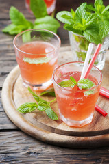 Strong alcohol cocktail with rum and mint