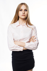 suspicious look of businesswoman on white background