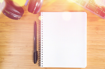 wooden table with office related objects, modern stylish work place, view from above
