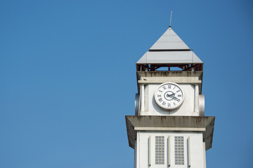 Fototapeta na wymiar Clock tower under a bright light