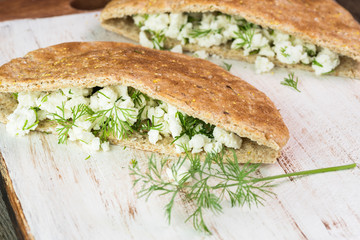 Feta stuffed pita pockets with dill.