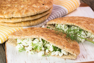 Feta stuffed pita pockets with dill.