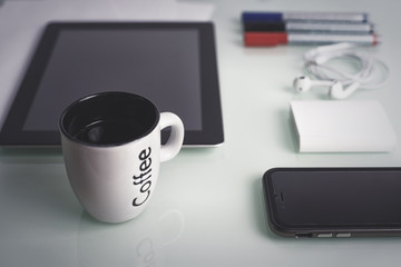 smartphone and  tablet on a table concept for  Web site