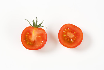 halved raw tomato