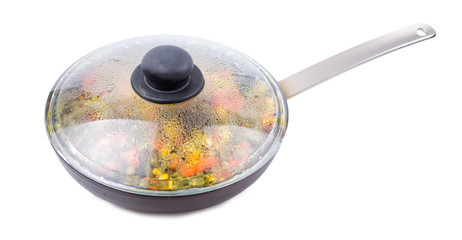 Mixed vegetables in a frying pan on