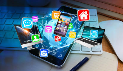 Tech devices connected to each other by mobile phone © sdecoret