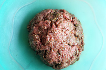 Raw Meatball Mixture in Bowl