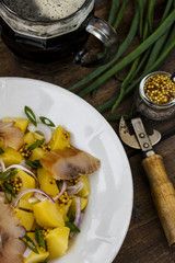salad with potato and smoked fish