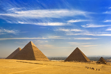 Egypt. Cairo - Giza. General view of pyramids from the Giza Plateau (from left: the Pyramid of Cheops, Chephren, Mykerinos and one of the small pyramids popularly known as Queens' Pyramids)