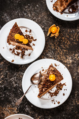 Three slices of pie on saucers. Stone background. Selective focus.