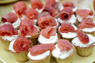 Tartlets with cheese and salmon
