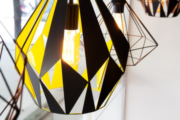 Edison's light bulb and lamp in modern style coffee shop. warm tone photo
