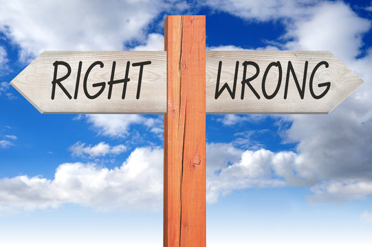 Right or wrong - wooden signpost