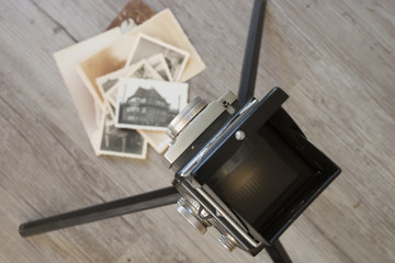 Old retro camera on wooden boards