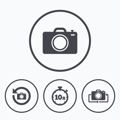 Photo camera icon. Flip turn or refresh signs.